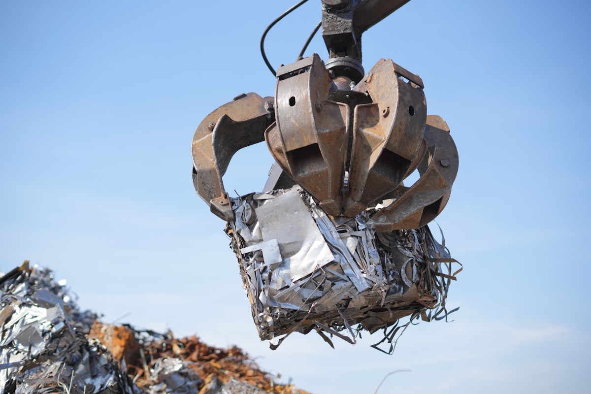 Crane grab lifting baled metal scrap